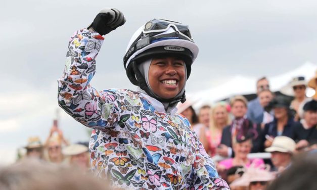 UK’s first Muslim female jockey to ride in hijab celebrates historic win at Goodwood