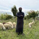 Visiting imam experiences farm life at Masjid Al Qur’an